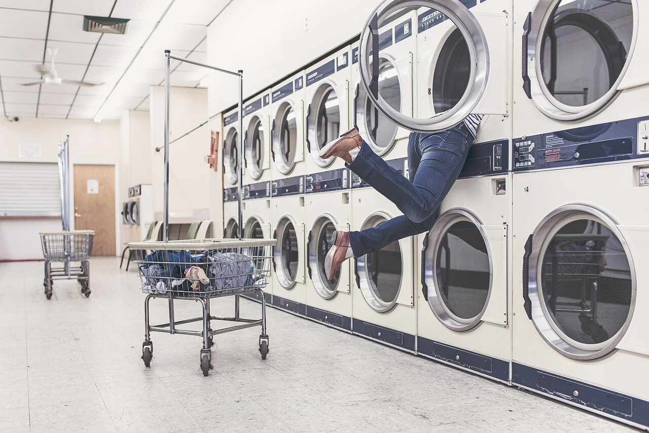 College student at Laundromat.