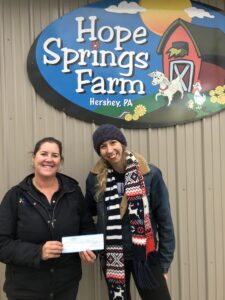 Handing Donation Check to Hope Springs Farm